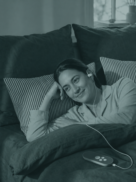 A person using Nurosym, a vagus nerve stimulation device for insomnia